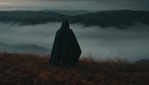 cloak,wanderer,the wanderer,caped,fog banks,hooded man,overlook,mysterious,mist,veil fog,foggy landscape,the spirit of the mountains,fog,the witch,before the dawn,sea of fog,arrival,the horizon,the fog,mystical,Photography,Documentary Photography,Documentary Photography 08