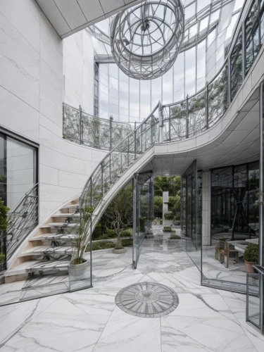 circular staircase,winding staircase,outside staircase,glass wall,glass facade,structural glass,spiral staircase,spiral stairs,steel stairs,glass building,staircase,stone stairs,revolving door,glass tiles,luxury property,stone floor,glass facades,glass panes,luxury home interior,marble palace,Architecture,Industrial Building,Masterpiece,High-tech Modernism