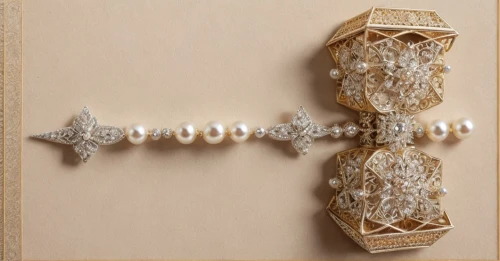 garter,bridal accessory,bookmark with flowers,hanging decoration,frame ornaments,patterned wood decoration,buddhist prayer beads,christmas garland,openwork frame,brooch,rosary,decorative art,decorative nutcracker,bicycle chain,advent decoration,prayer beads,wampum snake,thumbtack,paper art,sconce,Product Design,Jewelry Design,Europe,Romantic Charm