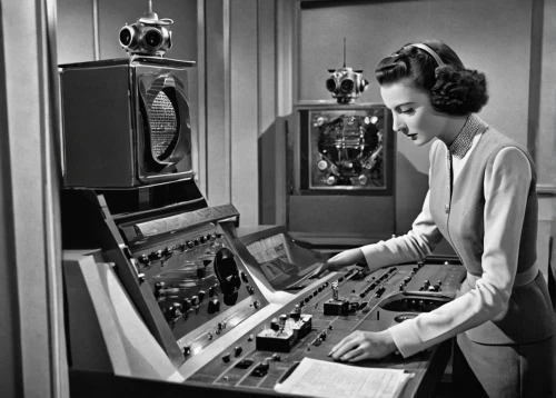 switchboard operator,telephone operator,control desk,control panel,tube radio,transmitter station,radio receiver,controls,television transmitter,mixing engineer,women in technology,aerial passenger line,dispatcher,control center,console mixing,radio set,two-way radio,stereophonic sound,mixing desk,audio mixer,Photography,Black and white photography,Black and White Photography 10
