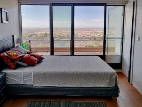 bedroom window,sky apartment,shared apartment,guest room,guestroom,modern room,new apartment,window with sea view,room divider,hotel room,condo,bonus room,penthouse apartment,panoramic views,accommodation,window view,apartment,hotel w barcelona,window treatment,sliding door