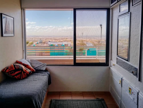 marrakech,bedroom window,sky apartment,shared apartment,tijuana,window with sea view,window view,an apartment,hotel room,apartment,accommodation,guest room,guestroom,view from window,albuquerque,hotelroom,boy's room picture,airbnb icon,with a view,tel aviv