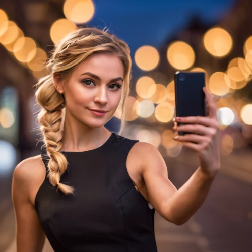 woman holding a smartphone,artificial hair integrations,blonde girl with christmas gift,the blonde photographer,photo session at night,blonde woman,black friday social media post,cyber monday social media post,portrait photographers,mobile camera,htc,phone icon,social,a girl with a camera,social media icon,the app on phone,women in technology,female model,taking photo,social media addiction