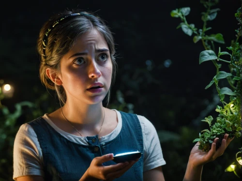 the night of kupala,woman eating apple,the girl in nightie,scene lighting,woman holding a smartphone,girl in the garden,social media addiction,girl in flowers,visual effect lighting,girl at the computer,the girl's face,jasmine-flowered nightshade,fairy lights,fireflies,lori,dizi,night administrator,clove garden,women in technology,digital compositing,Illustration,Realistic Fantasy,Realistic Fantasy 18