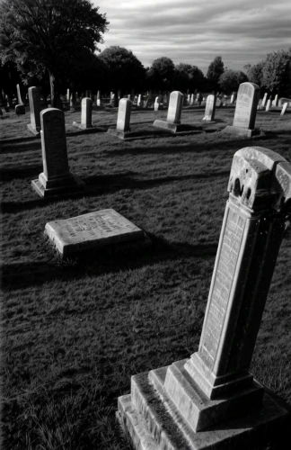 grave stones,burial ground,graveyard,gravestones,tombstones,resting place,old graveyard,cemetery,graves,cemetary,grave arrangement,central cemetery,jew cemetery,old cemetery,life after death,forest cemetery,tombstone,grave light,mourning,headstone