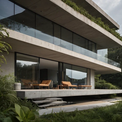 dunes house,modern house,modern architecture,glass facade,cubic house,house by the water,cube house,tropical house,residential house,holiday villa,eco hotel,luxury property,florida home,archidaily,corten steel,private house,residential,structural glass,exposed concrete,mid century house
