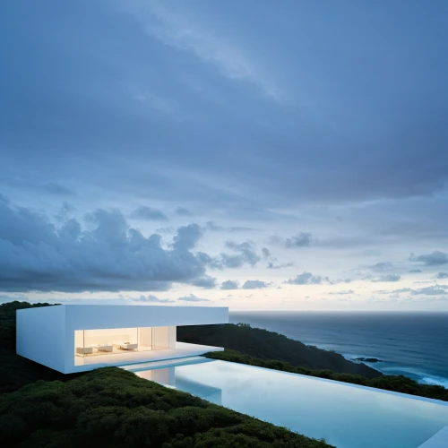 dunes house,infinity swimming pool,beach house,modern house,modern architecture,cube house,archidaily,roof landscape,summer house,luxury property,house of the sea,landscape design sydney,cubic house,holiday villa,pool house,ocean view,jeju island,glass facade,beachhouse,private house
