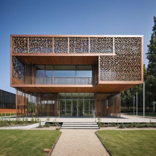 corten steel,lattice windows,wooden facade,building honeycomb,metal cladding,timber house,cubic house,glass facade,patterned wood decoration,archidaily,wood structure,ornamental dividers,modern architecture,house hevelius,honeycomb structure,lattice window,cube house,biotechnology research institute,eco-construction,assay office,Photography,General,Realistic