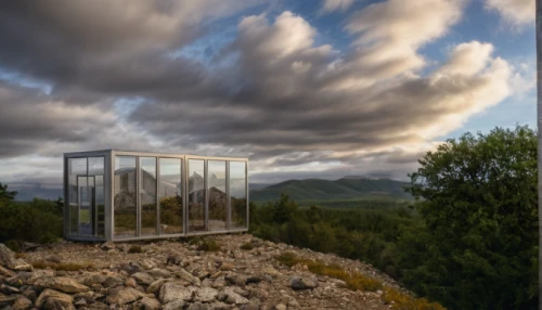 mirror house,glass rock,transparent window,observation tower,fire tower,glass pane,glass window,lookout tower,structural glass,window to the world,glass panes,the observation deck,klaus rinke's time field,vitrine,glass facade,cubic house,glass pyramid,will free enclosure,observation deck,water cube