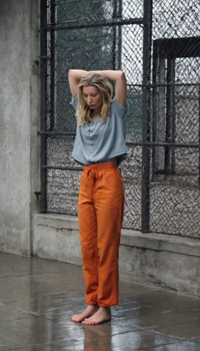 rain pants,sweatpant,sweatpants,menswear for women,stripped leggings,cargo pants,prisoner,loose pants,in the rain,orange,pjs,trousers,the blonde in the river,pants,wet,blonde woman,active pants,rain suit,tangerine,liberty cotton,Photography,Documentary Photography,Documentary Photography 27