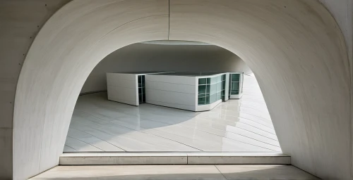 vaulted cellar,three centered arch,pointed arch,semi circle arch,vaulted ceiling,archidaily,arches,soumaya museum,round arch,hallway space,tempodrom,frame house,calatrava,convex,wall tunnel,colonnade,underpass,entry path,daylighting,outdoor structure,Photography,Documentary Photography,Documentary Photography 12