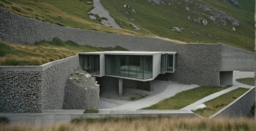 dunes house,slate roof,stelvio yoke,grass roof,stone house,brutalist architecture,cubic house,modern architecture,stonework,terraced,house in mountains,house in the mountains,exposed concrete,mountain hut,mountain stone edge,archidaily,transfagarasan,icelandic houses,concrete construction,neist point,Photography,Documentary Photography,Documentary Photography 12