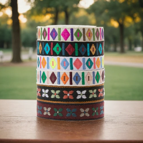 coffee cup sleeve,washi tape,flower pot holder,gift ribbons,coffee cups,gift ribbon,memorial ribbons,floral border paper,pattern stitched labels,stacked cups,ribbon awareness,printed mugs,paper cups,curved ribbon,prayer wheels,paper cup,square bokeh,patterned labels,bangles,mosaic tea light,Small Objects,Outdoor,Park