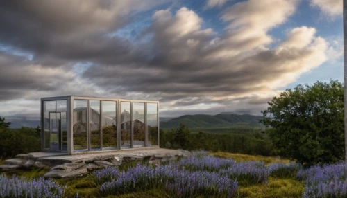 mirror house,glass rock,mirror in the meadow,glass window,vitrine,fire tower,glass panes,transparent window,water cube,structural glass,observation tower,salt meadow landscape,glass pane,blue ridge mountains,forest chapel,landscape designers sydney,glass facade,glass pyramid,window to the world,glass wall