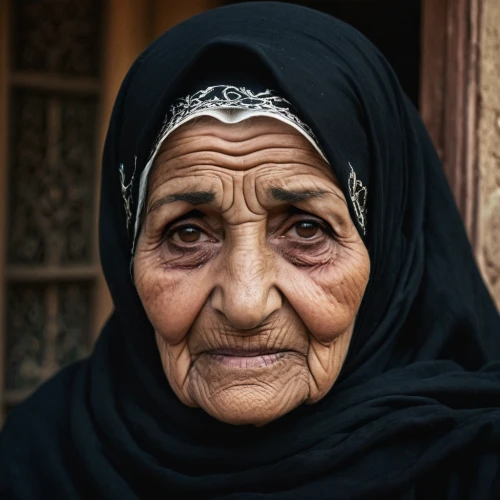 old woman,elderly lady,bedouin,pensioner,grandmother,elderly person,older person,jordanian,woman portrait,old age,muslim woman,care for the elderly,yemeni,iranian,middle eastern monk,bağlama,senior citizen,syrian,shopkeeper,vendor,Photography,General,Cinematic