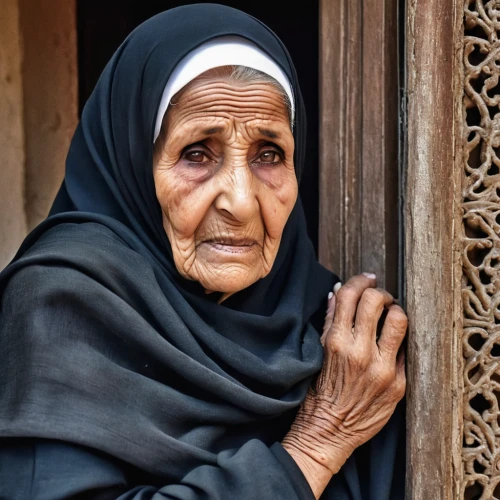 old woman,elderly lady,bedouin,care for the elderly,grandmother,pensioner,praying woman,muslim woman,middle eastern monk,elderly person,yemeni,jordanian,sudan,old age,older person,afar tribe,syrian,bağlama,i̇mam bayıldı,woman praying,Photography,General,Realistic