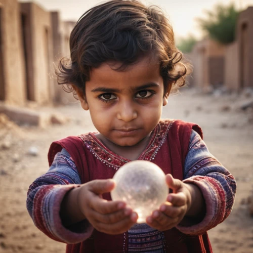 crystal ball-photography,nomadic children,child playing,world children's day,playing with ball,pakistani boy,crystal ball,little girl with balloons,bedouin,bubble blower,jaisalmer,soap bubble,yemeni,india,photographing children,children of war,children playing,little girl in pink dress,photos of children,inflates soap bubbles,Photography,General,Cinematic