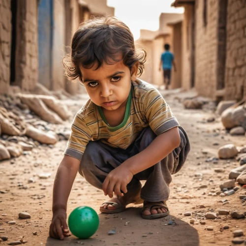 child playing,playing with ball,pakistani boy,yemeni,nomadic children,world children's day,children playing,children of war,children play,stick and ball games,street football,baby playing with toys,sudan,photographing children,photos of children,jaisalmer,child protection,water balloon,syrian,kinder surprise,Photography,General,Natural