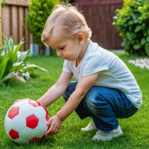 children's soccer,artificial grass,playing with ball,artificial turf,soccer ball,child playing,playing outdoors,playing football,footballer,youth sports,soccer player,stick and ball games,indoor games and sports,mini rugby,stick and ball sports,futebol de salão,kids' things,outdoor play equipment,grass golf ball,soccer,Photography,General,Realistic