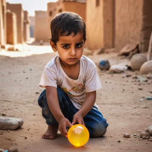 child playing,nomadic children,yemeni,playing with ball,world children's day,children playing,baby playing with toys,pakistani boy,children of war,bedouin,water balloon,fetching water,photos of children,crystal ball-photography,children play,photographing children,little girl with balloons,poverty,syrian,kinder surprise,Photography,General,Commercial