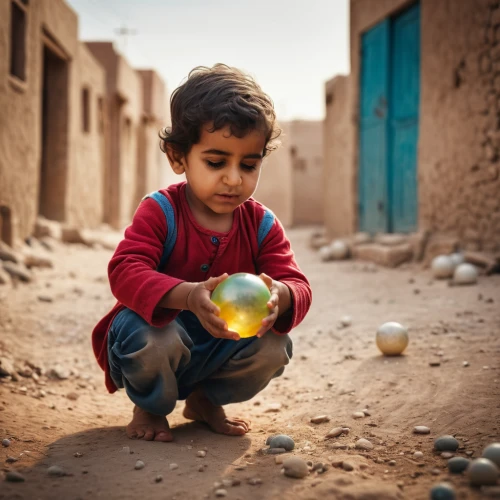 child playing,nomadic children,crystal ball-photography,world children's day,pakistani boy,playing with ball,children playing,children of war,baby playing with toys,yemeni,children play,crystal ball,photographing children,baloch,poverty,photos of children,children learning,juggling,child with a book,little girl with balloons,Photography,General,Cinematic