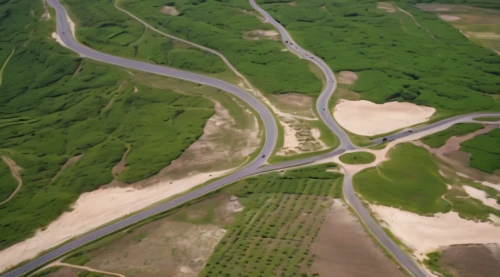 72 turns on nujiang river,meanders,winding roads,braided river,winding road,mosel loop,river delta,fluvial landforms of streams,meander,polder,landform,yamada's rice fields,saar loop,aeolian landform,aerial landscape,national highway,river course,roads,viñales valley,dji agriculture