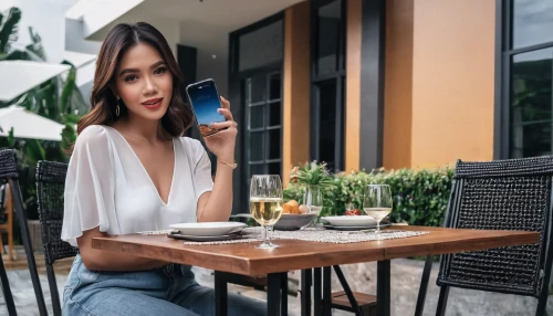 woman at cafe,woman holding a smartphone,woman drinking coffee,restaurants online,women at cafe,e-wallet,outdoor dining,outdoor table,woman sitting,coffee background,payments online,alipay,woman eating apple,viewphone,blue coffee cups,mobile payment,vietnamese,dining,on the phone,mobile device,Photography,General,Natural