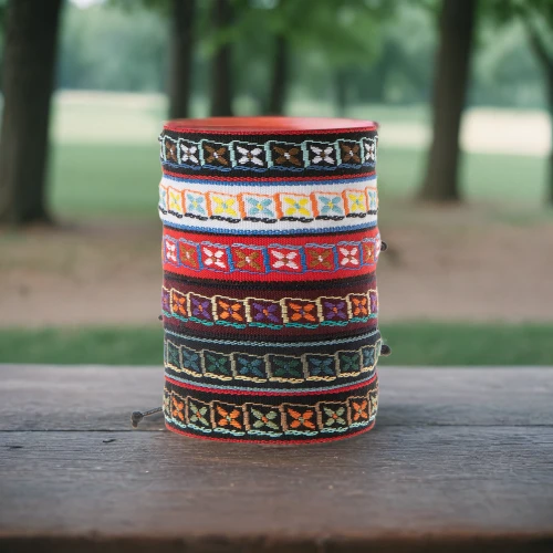 pattern stitched labels,prayer wheels,bracelets,washi tape,bangles,memorial ribbons,reed belt,bracelet jewelry,patterned labels,belts,tibetan bowls,wristband,traditional patterns,stacked cups,east indian pattern,tibetan bowl,gift ribbons,bracelet,lace stitched labels,ribbon awareness,Small Objects,Outdoor,Park