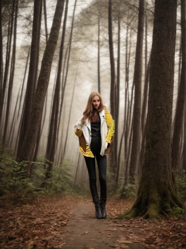 yellow fir,yellow and black,portrait photography,yellow jumpsuit,girl walking away,sprint woman,tofino,woman walking,trespassing,forest walk,queen-elizabeth-forest-park,autumn photo session,yellow jacket,magnolieacease,blonde woman,walking in the rain,portrait photographers,spruce shoot,blond girl,yellow background