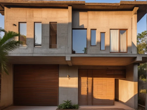 dunes house,modern house,modern architecture,corten steel,timber house,wooden facade,tropical house,cubic house,residential house,wooden house,exposed concrete,beach house,mid century house,concrete blocks,cube stilt houses,floorplan home,house shape,two story house,frame house,folding roof,Photography,General,Realistic