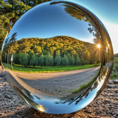 crystal ball-photography,glass sphere,crystal ball,lensball,glass ball,parabolic mirror,magnify glass,lens reflection,giant soap bubble,magnifying lens,spherical image,exterior mirror,looking glass,mirror in the meadow,magnifying glass,earth in focus,mirror in a drop,parallel worlds,soap bubble,wood mirror,Photography,General,Realistic
