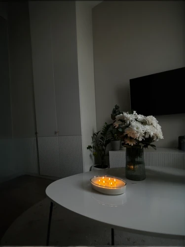 visual effect lighting,hygge,danish room,home fragrance,3d render,3d rendering,modern decor,ambient lights,danish furniture,modern room,table lamp,scandinavian style,contemporary decor,home interior,render,coffee table,halogen spotlights,flower arrangement lying,tealight,search interior solutions