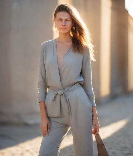 jumpsuit,pantsuit,menswear for women,denim jumpsuit,woman in menswear,bolero jacket,yellow jumpsuit,one-piece garment,women fashion,navy suit,suit trousers,women clothes,plus-size model,women's clothing,neutral color,female model,trench coat,khaki,tracksuit,summer coat