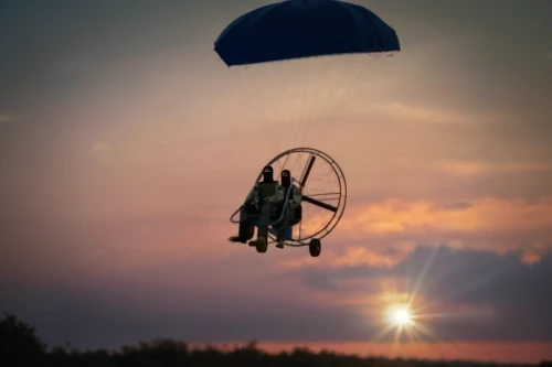 paraglider sunset,paramotor,paratrooper,paraglider,paraglide,powered parachute,parachutist,bi-place paraglider,figure of paragliding,paragliding-paraglider,harness-paraglider,parachuting,paragliding,paraglider flyer,harness paragliding,mountain paraglider,parachute fly,parachute,powered paragliding,sitting paragliding