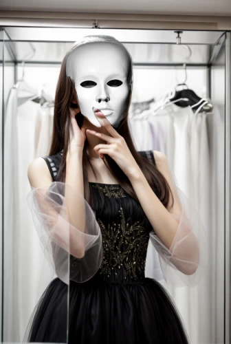 doll looking in mirror,makeup mirror,dress shop,the mirror,magic mirror,woman face,mannequin,put on makeup,anonymous mask,bridal clothing,dressing room,women's closet,hanging mask,masquerade,make-up,dress doll,make over,woman's face,crossdressing,dressmaker