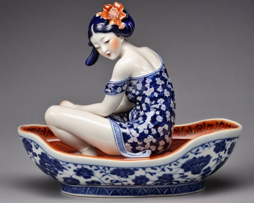 blue and white porcelain,junshan yinzhen,earthenware,japanese art,woman sitting,figurine,porcelaine,decorative figure,stoneware,girl with cereal bowl,chinese art,ceramic,miniature figure,ceramics,tureen,chinese teacup,girl sitting,sake set,japanese garden ornament,japanese doll,Photography,General,Realistic