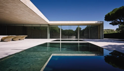 modern architecture,dunes house,pool house,infinity swimming pool,archidaily,modern house,mid century modern,mid century house,luxury property,exposed concrete,corten steel,reflecting pool,architecture,summer house,contemporary,swimming pool,architectural,cube house,aqua studio,glass facade,Photography,Black and white photography,Black and White Photography 10