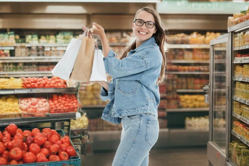 girl in overalls,shopper,denim jumpsuit,grocery,grocer,woman shopping,shopping icon,groceries,grocery basket,supermarket,woman eating apple,grocery shopping,consumer protection,grocery store,consumer,overalls,grocery bag,shopping list,whole food,shopping basket
