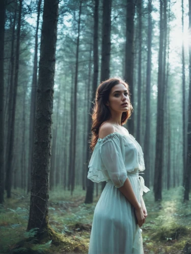 ballerina in the woods,mystical portrait of a girl,girl with tree,dryad,forest of dreams,enchanted,enchanted forest,faerie,in the forest,enchanting,vintage woman,girl in a long dress,faery,forest background,fairy forest,conceptual photography,fae,the enchantress,holy forest,portrait photography