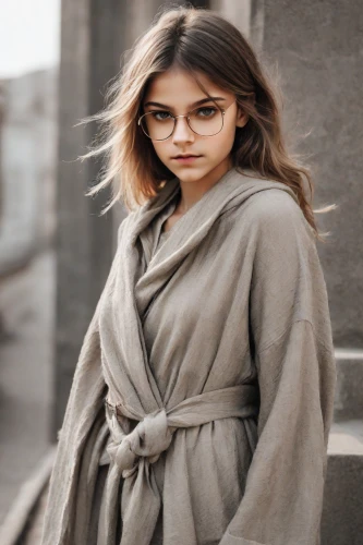 with glasses,librarian,girl in a historic way,reading glasses,women fashion,romantic look,girl in cloth,menswear for women,portrait background,glasses,iranian,raw silk,silver framed glasses,young model istanbul,long coat,kimono,blanket,women clothes,portrait photography,city ​​portrait,Photography,Realistic