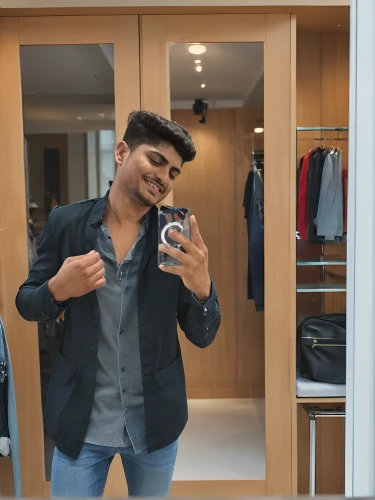 changing room,stylish boy,dressing room,shop fittings,men clothes,mobile click,indian celebrity,blur office background,fittings,smart look,denims,send cute,pakistani boy,wardrobe,shopping venture,boy's room picture,thavil,bolero jacket,door mirror,changing rooms