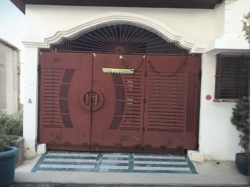 front door,garden door,main door,creepy doorway,iron door,house entrance,front gate,garage door,church door,home door,wooden door,hinged doors,the door,doors,steel door,doorway,old door,roller shutter,metallic door,entrance