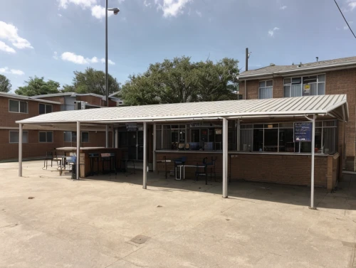 prefabricated buildings,awnings,canteen,cafeteria,community centre,houston texas apartment complex,state school,restaurant,clover hill tavern,barracks,secondary school,kitchen block,the pub,awning,beer garden,elementary school,clubhouse,bar,barbecue area,veranda