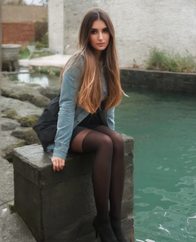 hallia venezia,leather boots,spanish steps,girl on the river,crossed legs,romanian,in pantyhose,pantyhose,beautiful young woman,female model,white boots,photoshoot with water,legs crossed,black shoes,ankle boots,black skirt,rubber boots,liana,beautiful legs,on the pier