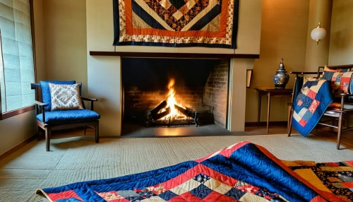 fire place,fireplace,mexican blanket,fireplaces,sitting room,bannack camping tipi,interior decor,moroccan pattern,warm and cozy,fire screen,persian norooz,tapestry,home interior,rug,wood-burning stove,livingroom,tipi,living room,family room,hearth,Photography,General,Realistic