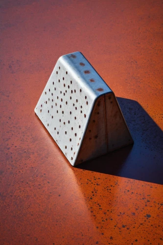 dice cup,spice grater,cube surface,cheese grater,sanding block,corten steel,grater,cajon microphone,kitchen grater,diamond plate,butter dish,concrete blocks,zippo,danbo cheese,cigarettes on ashtray,matchbox,chess cube,cigarette box,square bokeh,cement block,Conceptual Art,Daily,Daily 33