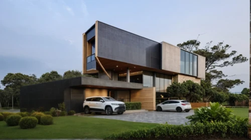 cube house,modern house,modern architecture,residential house,cubic house,landscape design sydney,build by mirza golam pir,dunes house,landscape designers sydney,residential,timber house,smart home,folding roof,house shape,cube stilt houses,smart house,corten steel,metal cladding,chandigarh,frame house