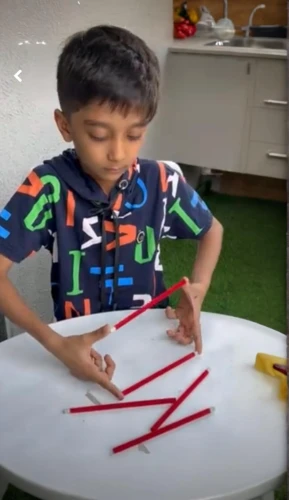 rakshabandhan,rakhi,hand draw arrows,drinking straws,home learning,fabric scissors,table artist,children learning,children drawing,clay animation,rangoli,paper snakes,spirograph,teaching children to recycle,draw arrows,motor skills toy,pakistani boy,pipe cleaner,montessori,coping saw