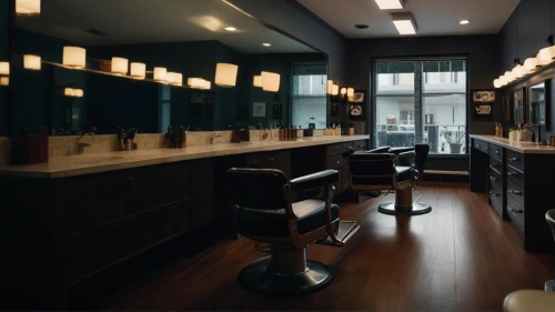 barber shop,barbershop,salon,dark cabinetry,barber chair,beauty room,beauty salon,barber,hairdressing,bar counter,dark cabinets,hairdressers,cosmetics counter,barstools,piano bar,track lighting,under-cabinet lighting,cabinetry,the long-hair cutter,assay office