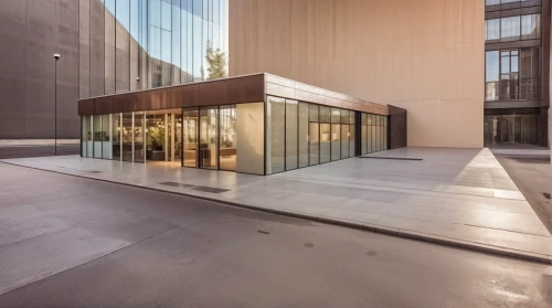 glass facade,corten steel,glass wall,metal cladding,glass facades,glass building,archidaily,cubic house,vitrine,structural glass,apple store,glass panes,sliding door,cube house,modern architecture,daylighting,modern office,mirror house,exposed concrete,powerglass
